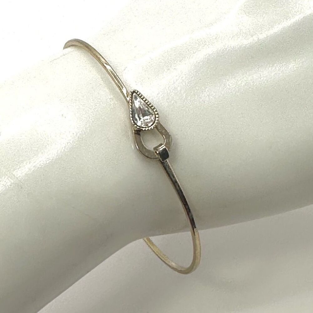 Gold tone rhinestone bangle bracelet